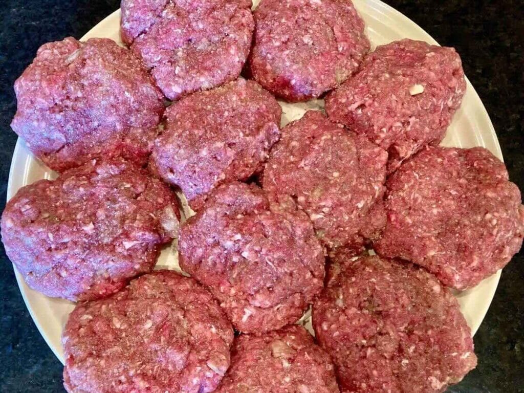 Hamburger patties on plate