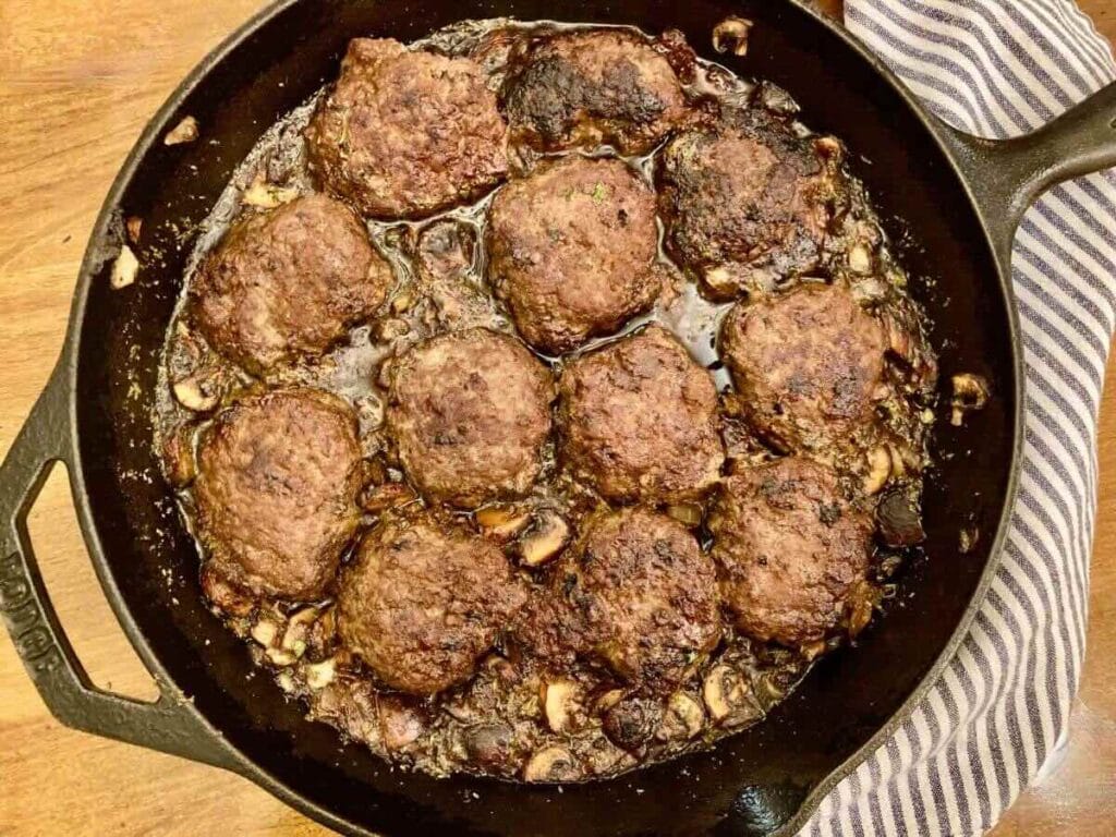 cast iron skillet with gluten-free Salisbury Steak