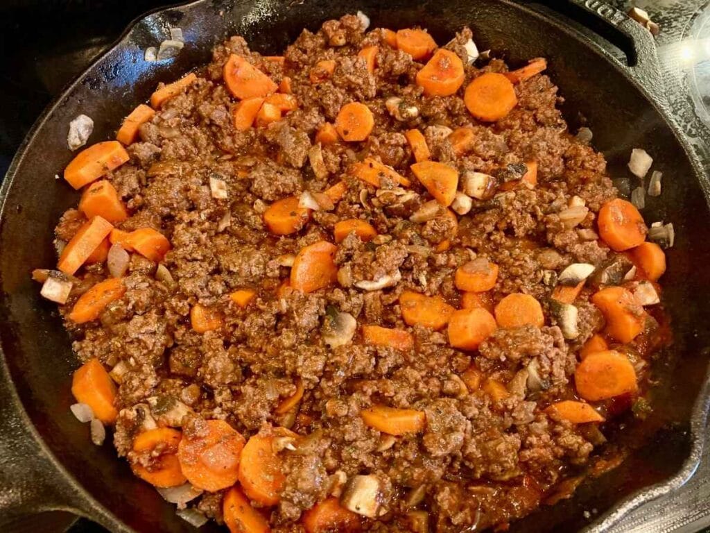 Ground beef and vegetable mixture in skillet