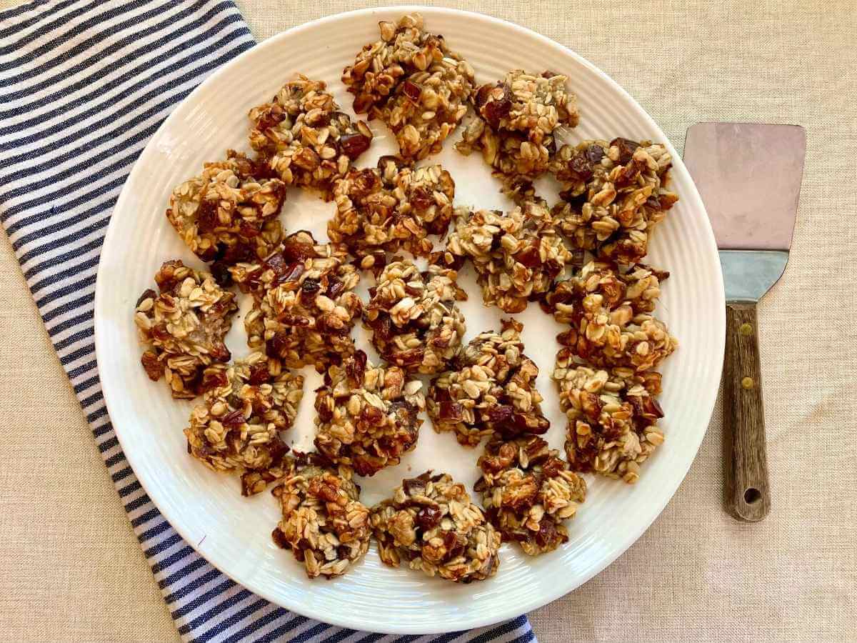 Plate with banana and date oatmeal cookies.