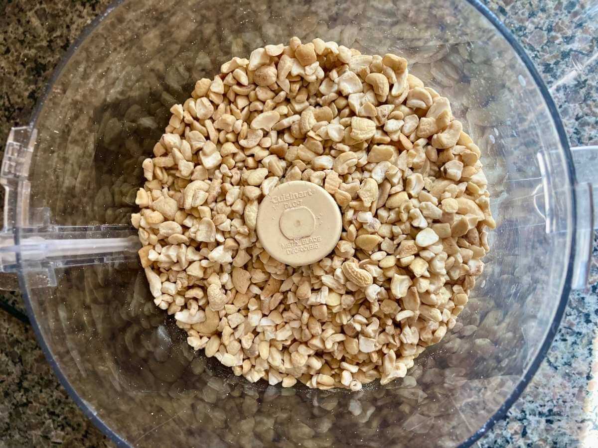 Cashew pieces in a food processor.