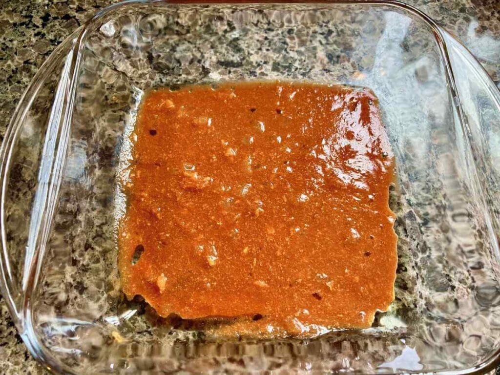 Tomato sauce in a baking dish.