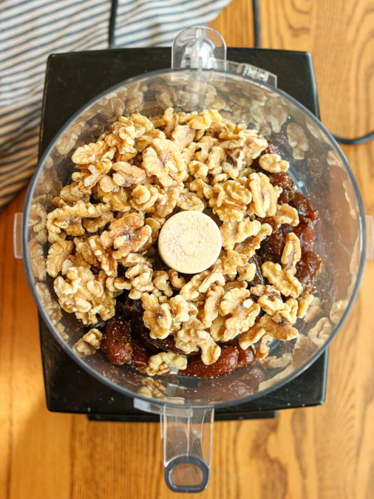 Walnuts, dates, and the rest of the ingredients in a food processor.