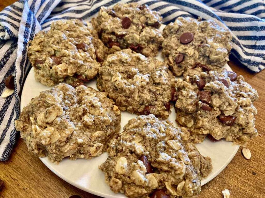 Gluten-free chocolate oatmeal cookies on a plate.