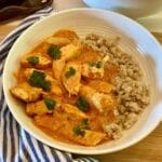 Indian chicken curry in a bowl with quinoa.