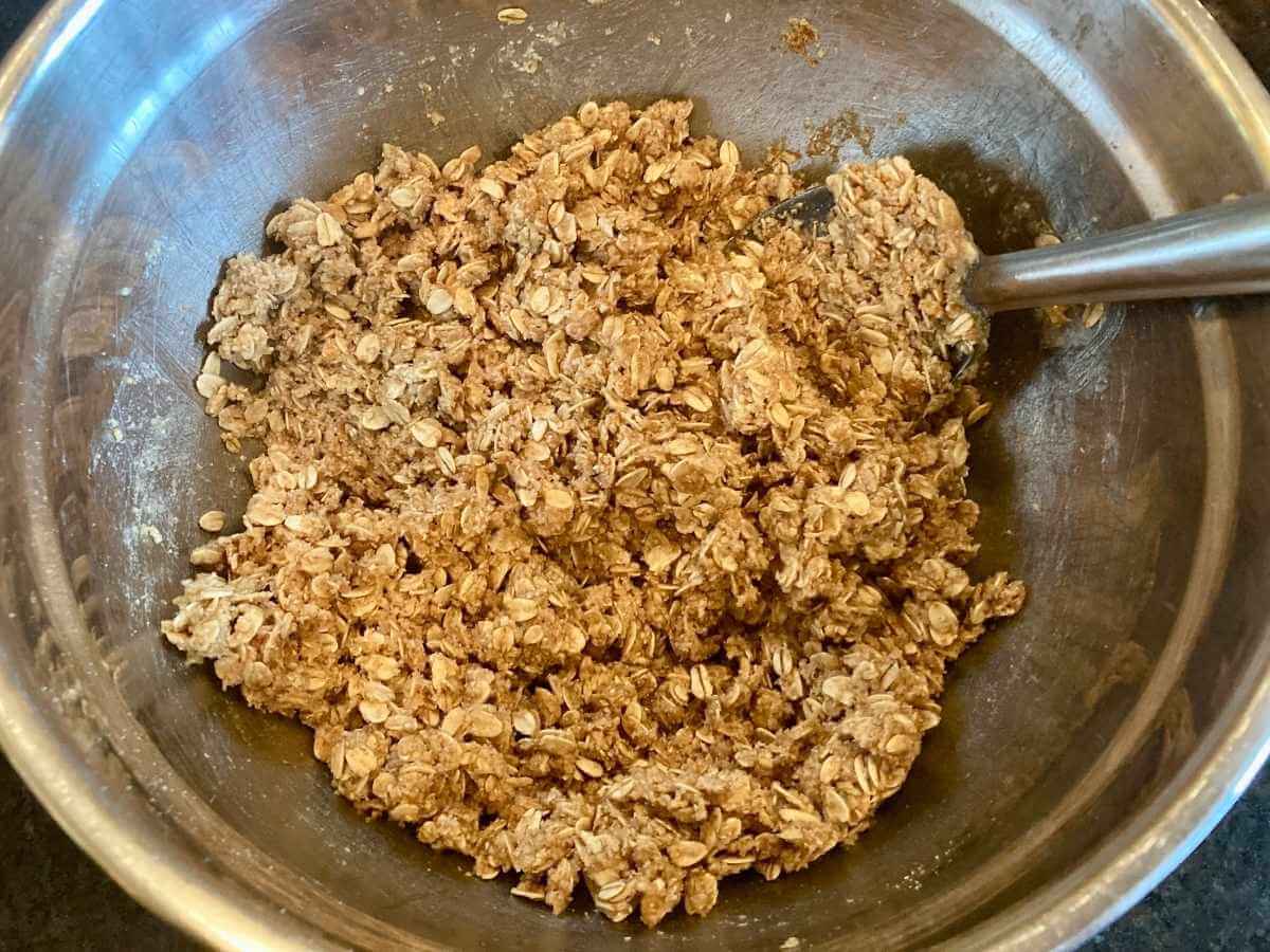 Mixing topping in a bowl.