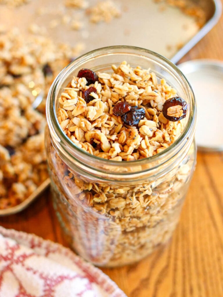 A glass mason jar filled with homemade granola.