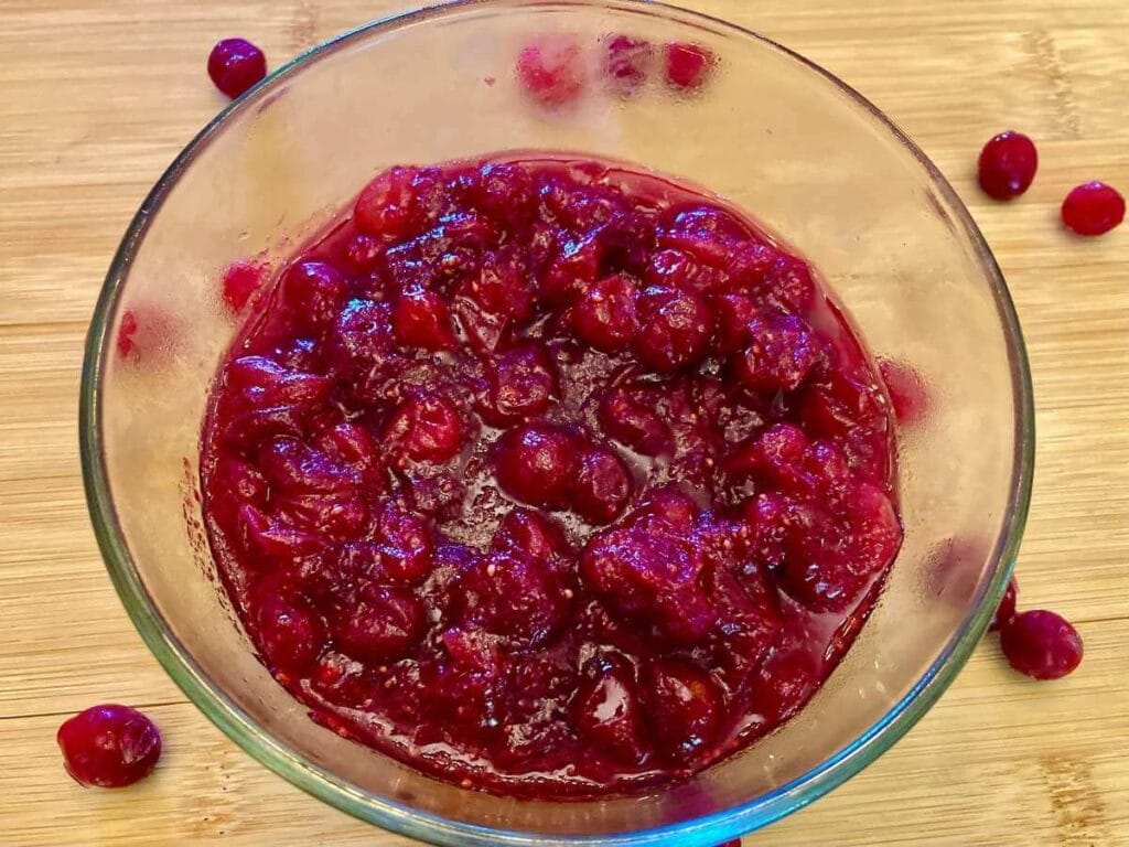 Refined sugar-free cranberry sauce in a glass bowl.