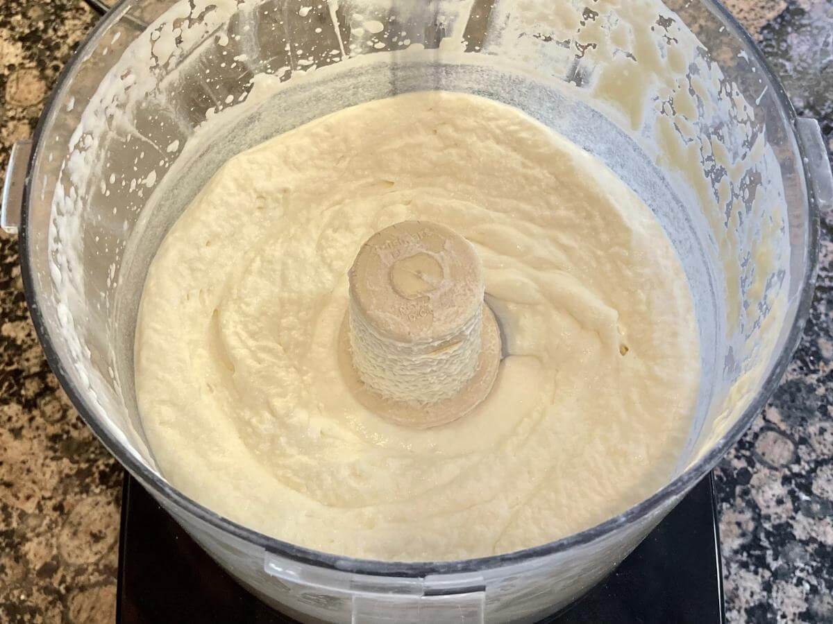 Whipped cream in a food processor.