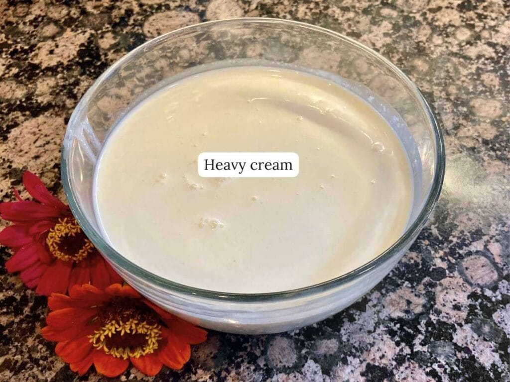 Heavy cream in a bowl.