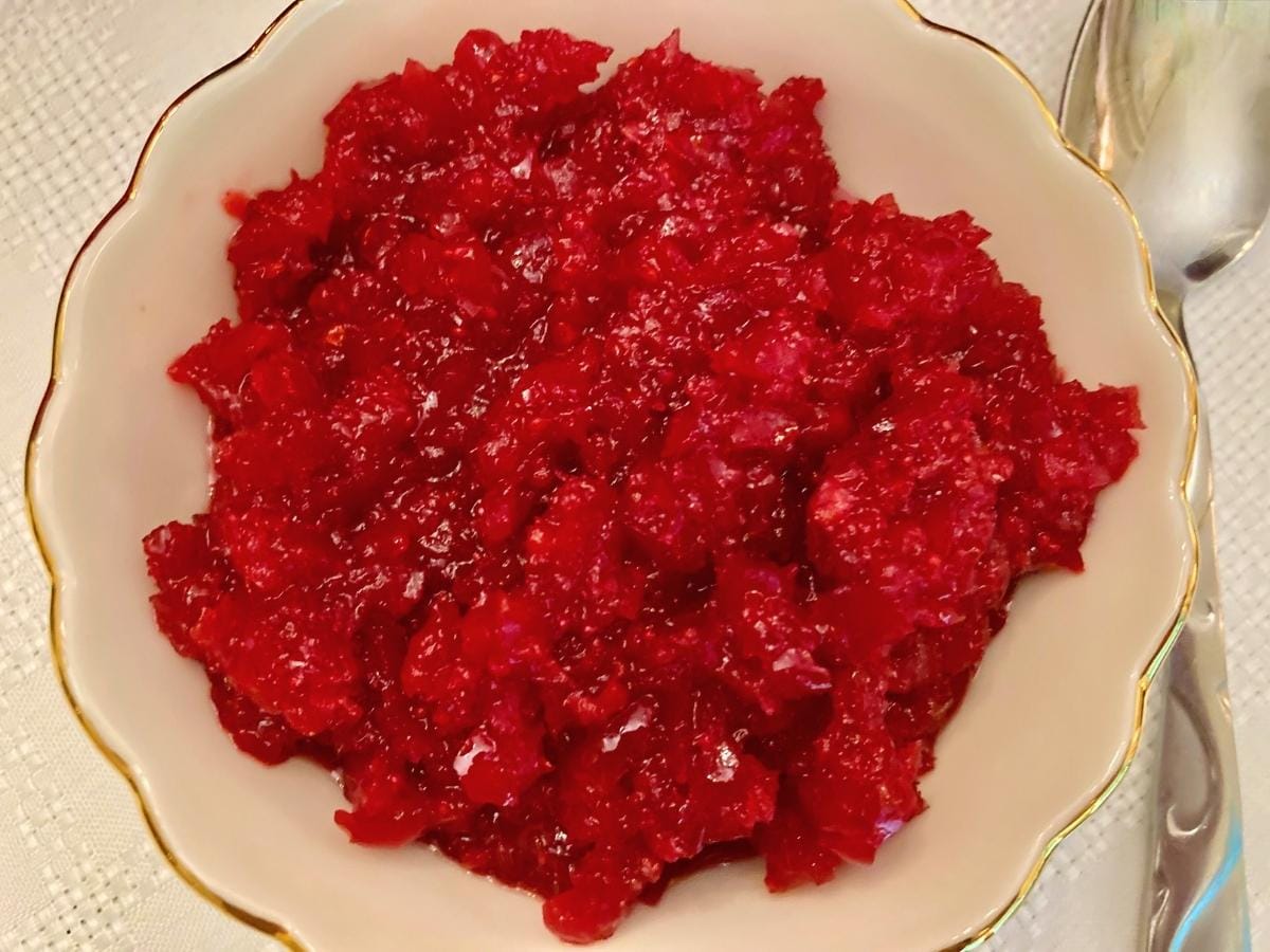Closeup of fermented cranberries in a bowl.