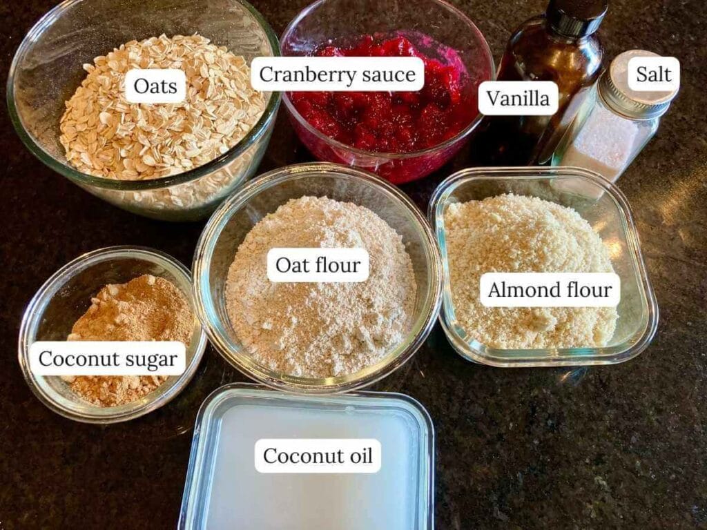 Ingredients for gluten-free cranberry crisp bars on a counter.