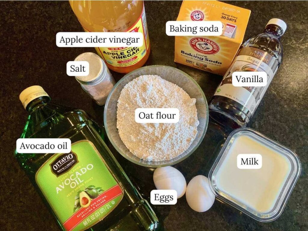 Ingredients for gluten-free oat flour pancakes on a counter.