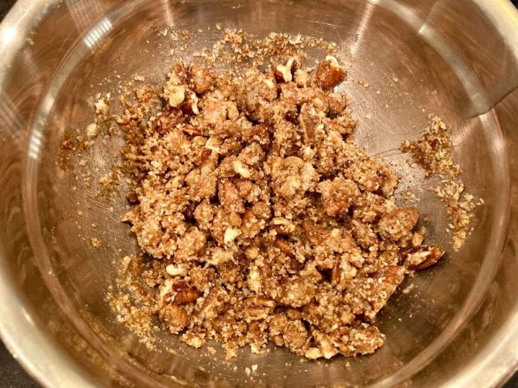 Sweet potato casserole topping in a mixing bowl.