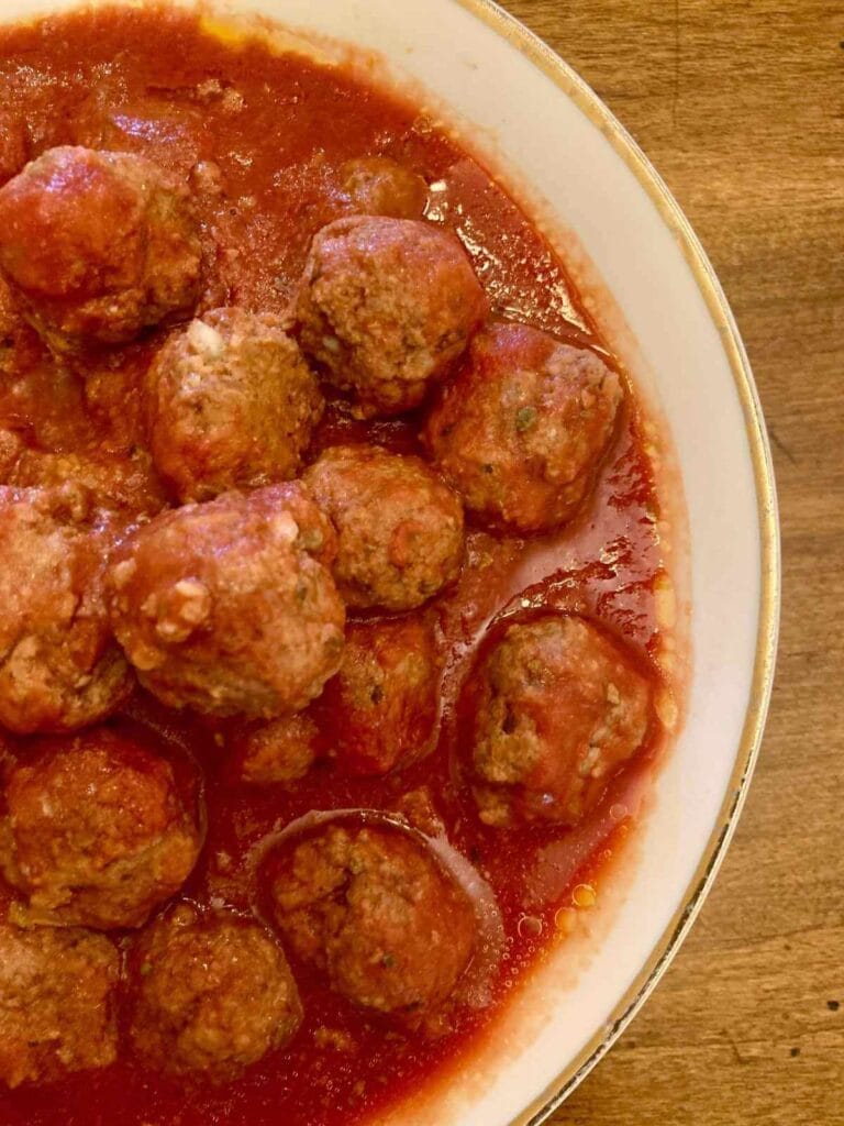 Closeup of gluten-free meatballs in a bowl.