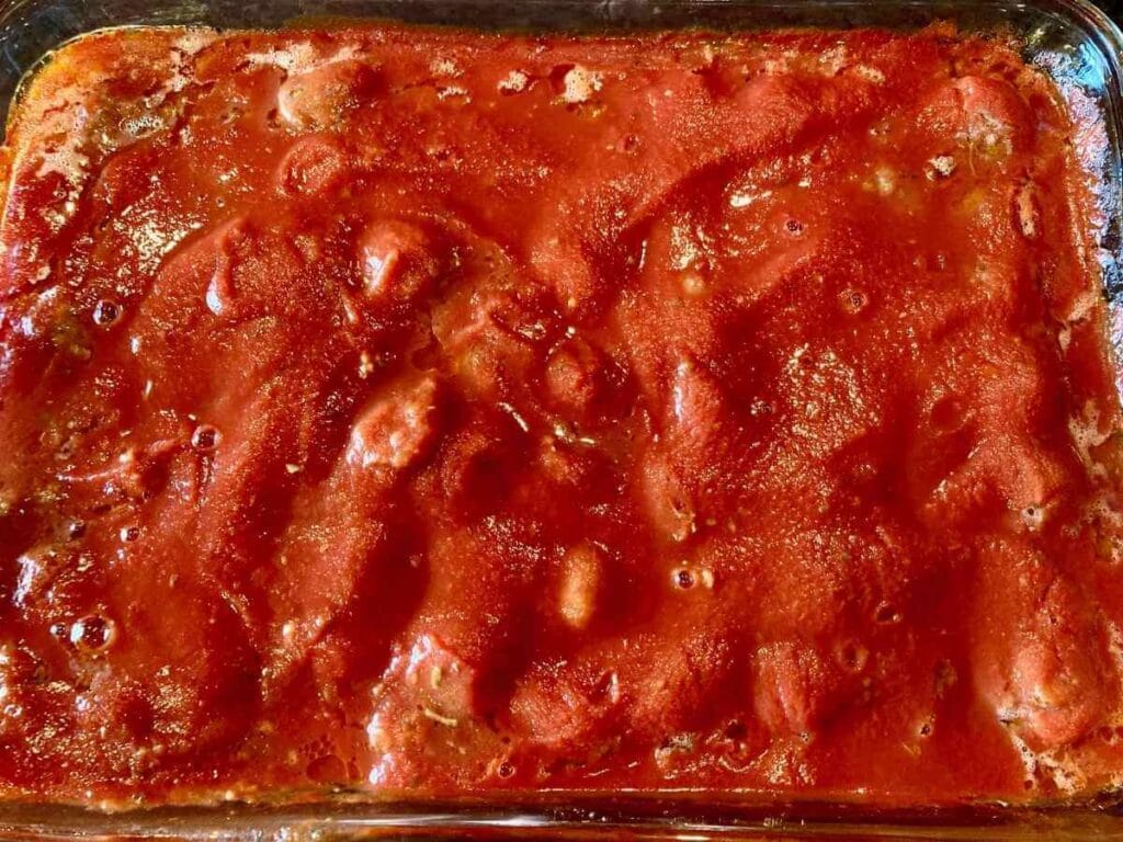 Meatballs in a baking dish right out of the oven.