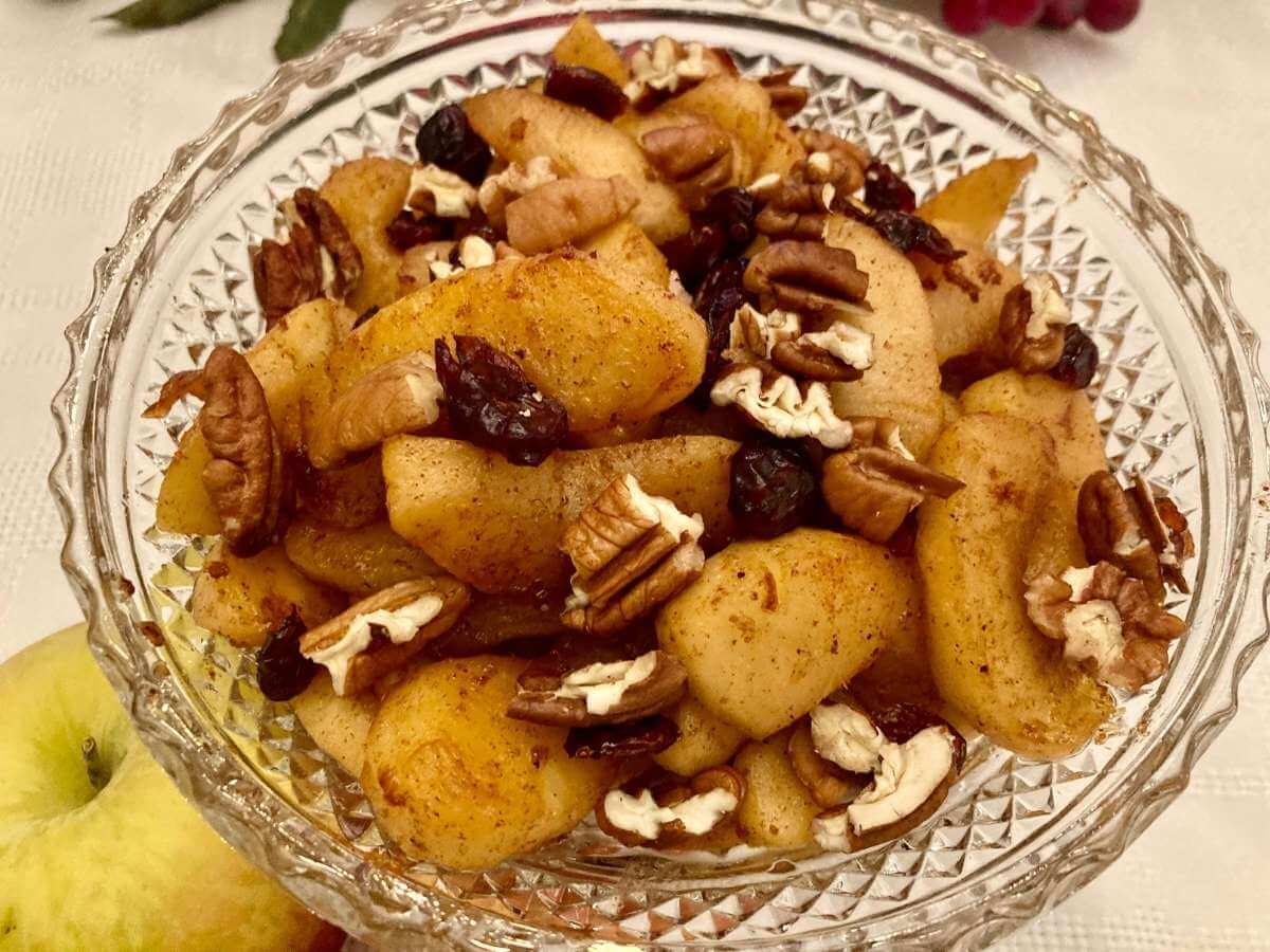 Healthy fried apples in a glass serving dish.