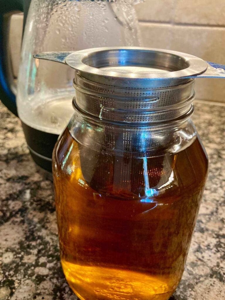 Tea steeping in a mason jar.