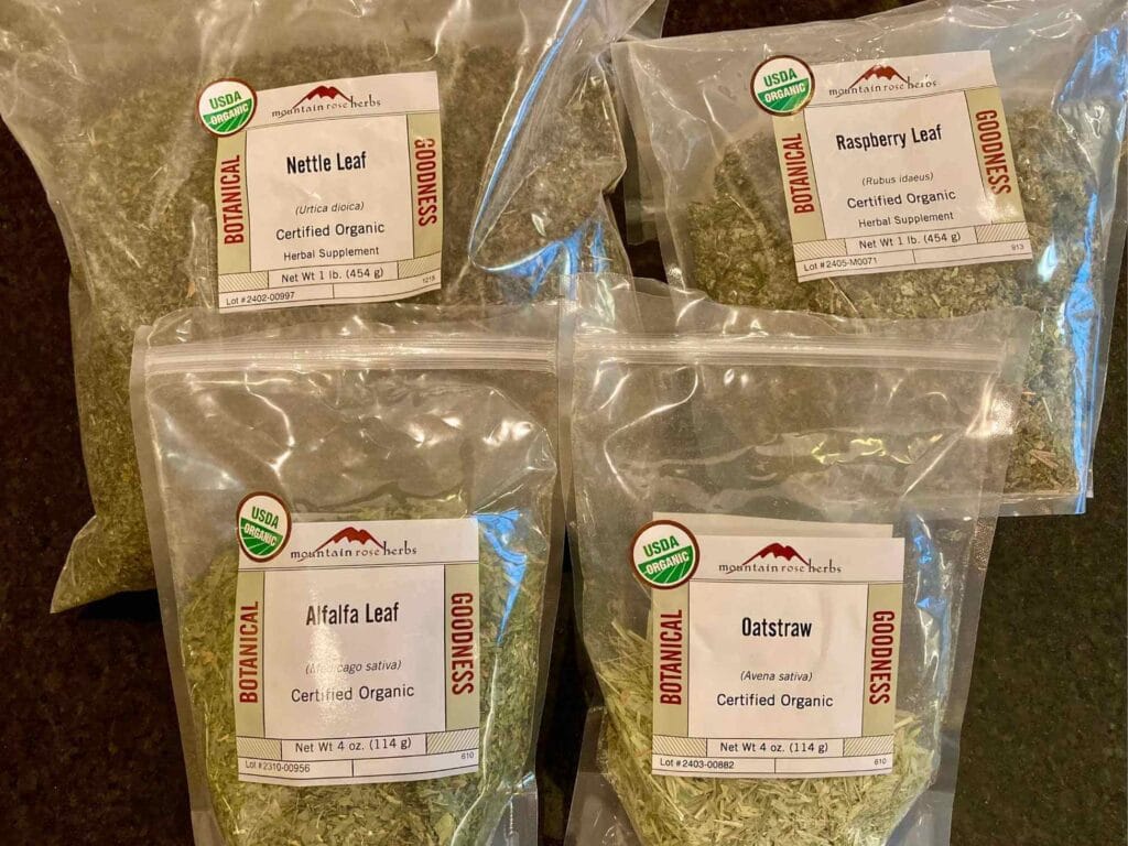 Ingredients for NORA tea including nettle, oatstraw, red raspberry leaf, and alfalfa.