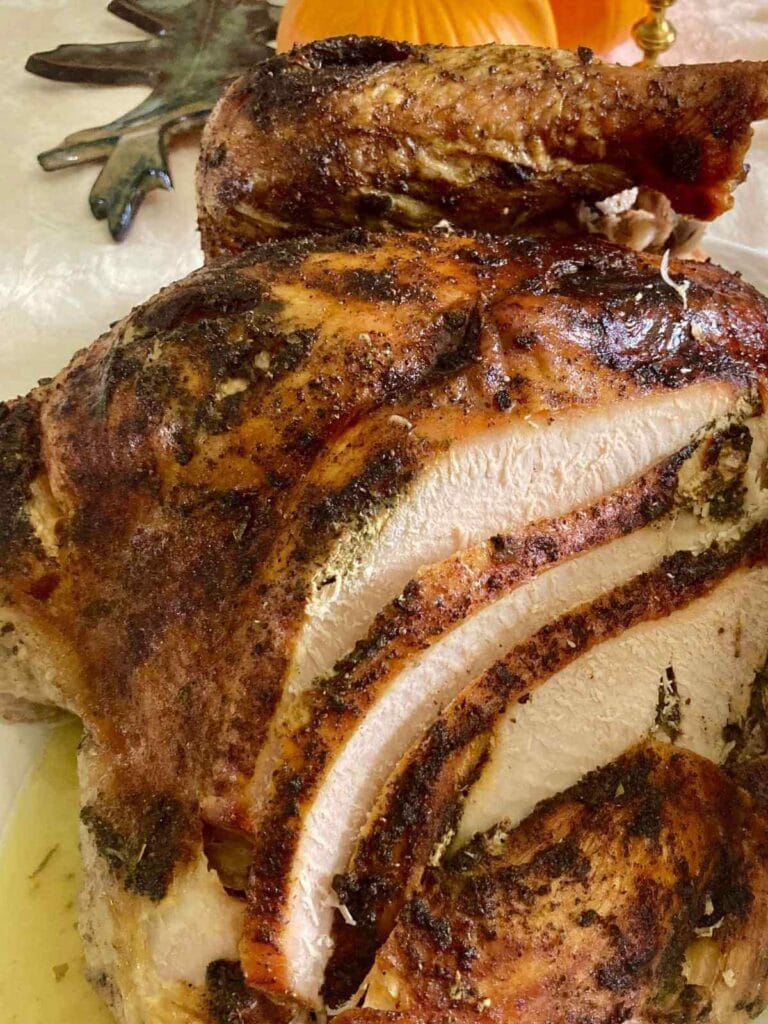 Thanksgiving turkey that has been partially carved.