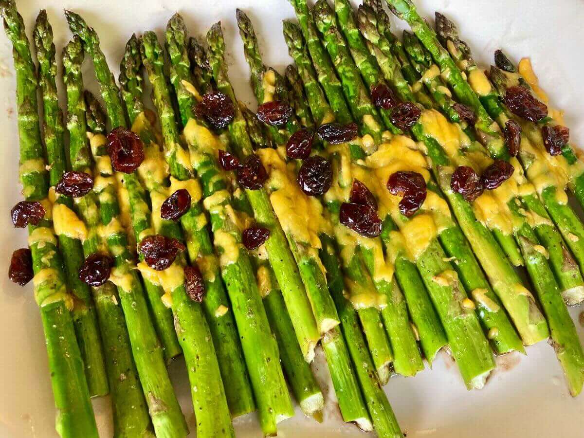 Cheesy balsamic asparagus on serving platter