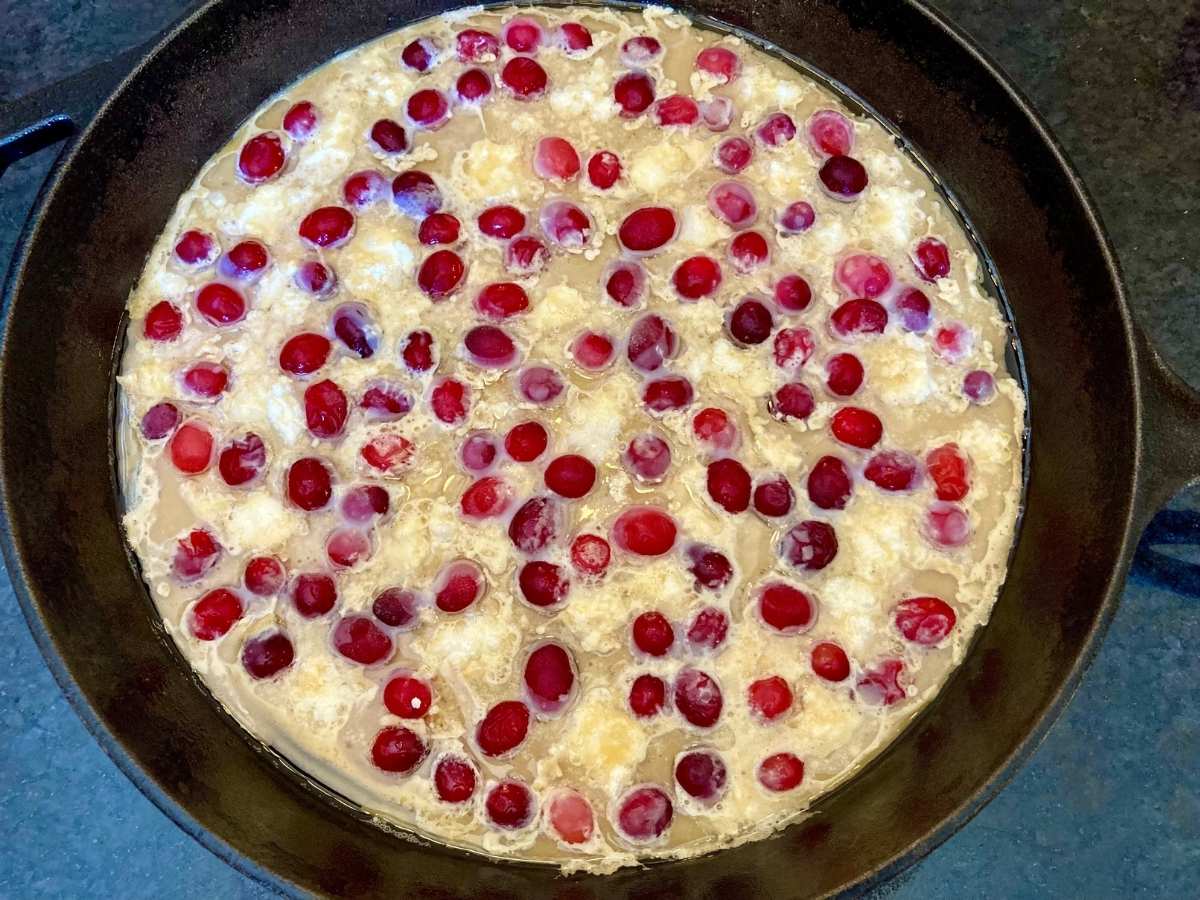cranberry cheesecake dutch baby before baking