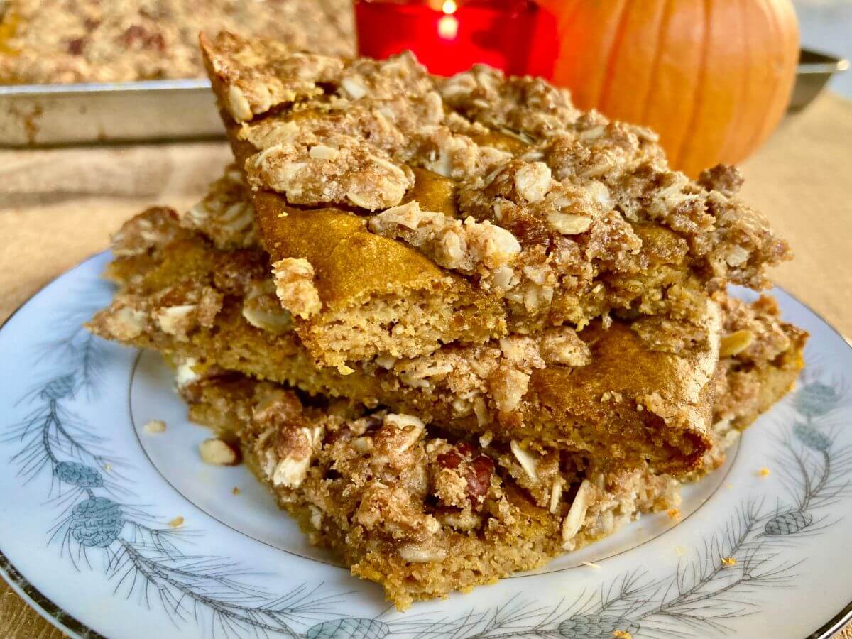 3 slices of Pumpkin Crisp Sheet-Pan Pancakes on plate