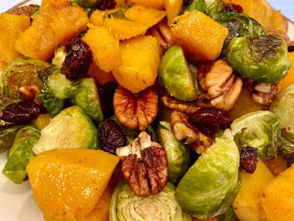 Closeup of roasted Brussels sprouts and butternut squash