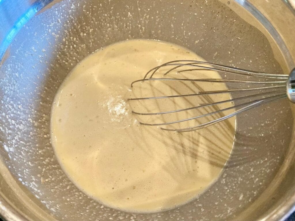 Whisking batter in bowl