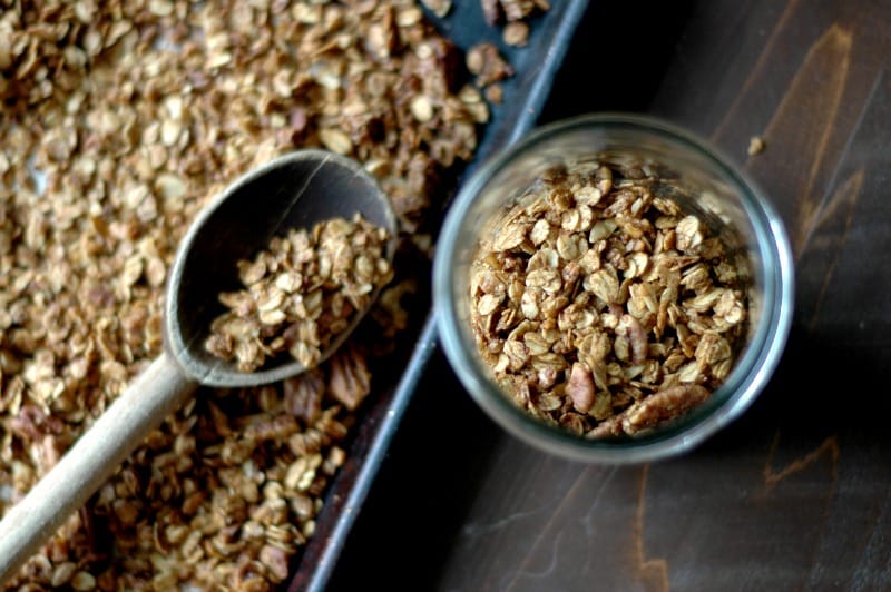 gingerbread granola on a pan and in bowl