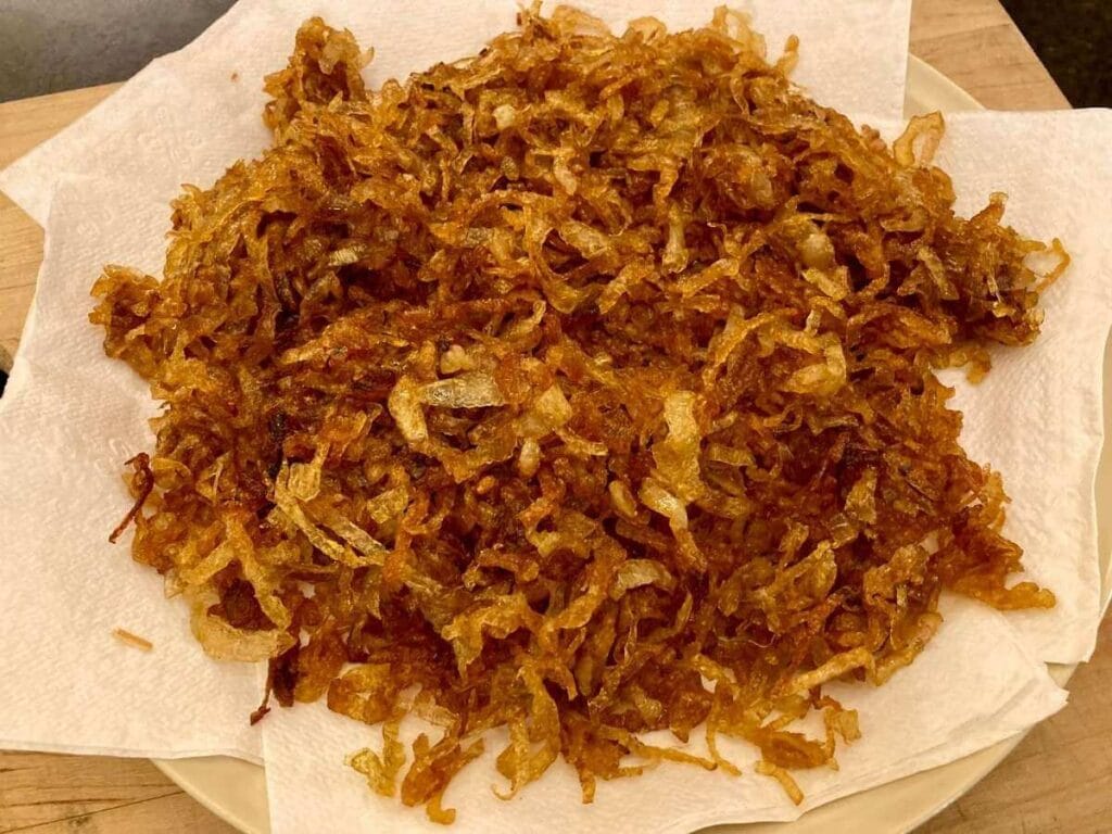 Closeup of fried onions on plate