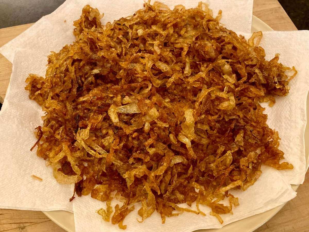 Closeup of fried onions on plate