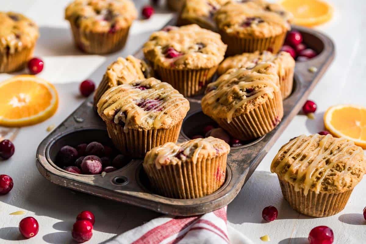 Cranberry orange muffins in a muffin tin