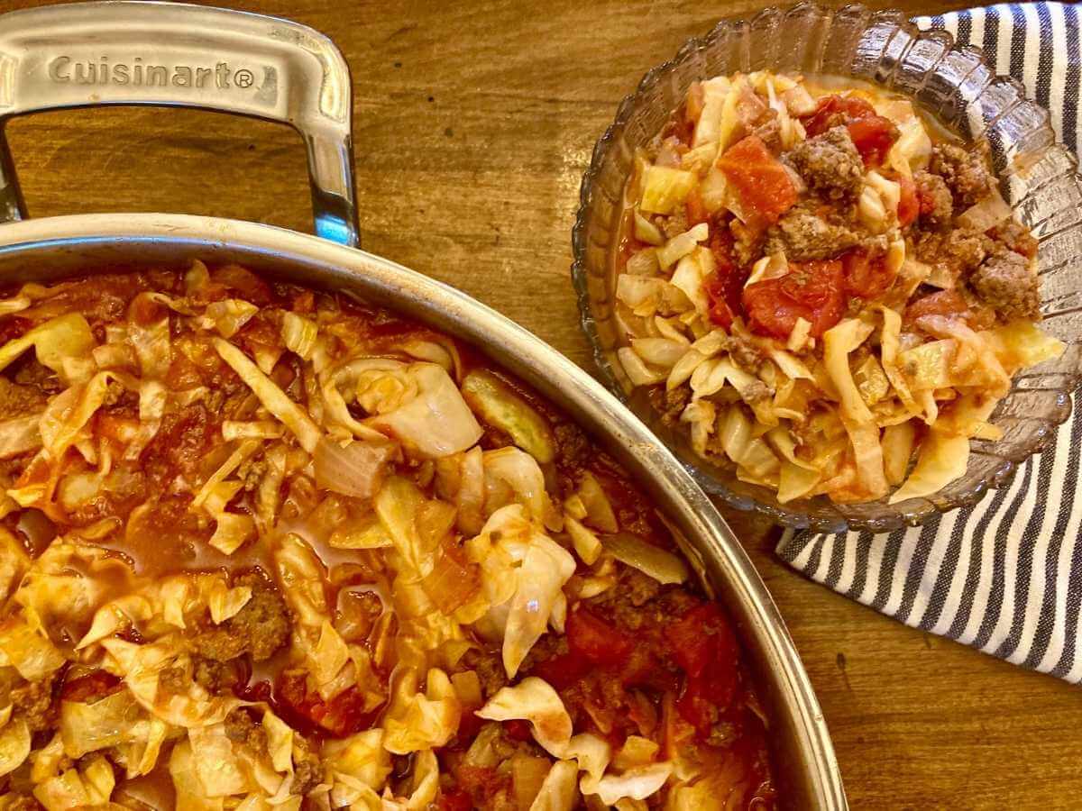 Bowl and skillet on cabbage roll in a bowl