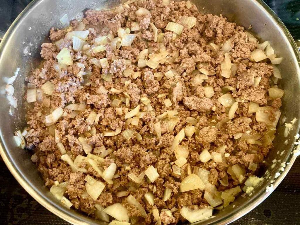 Browning ground beef and onions