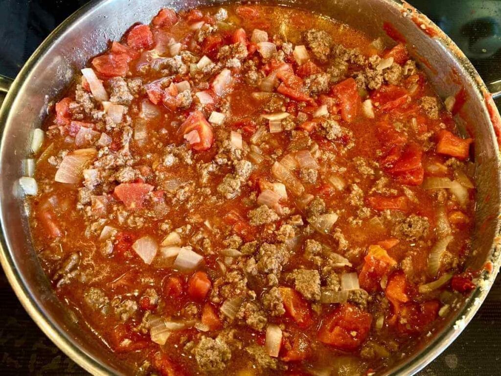 Adding ingredients to browned meat