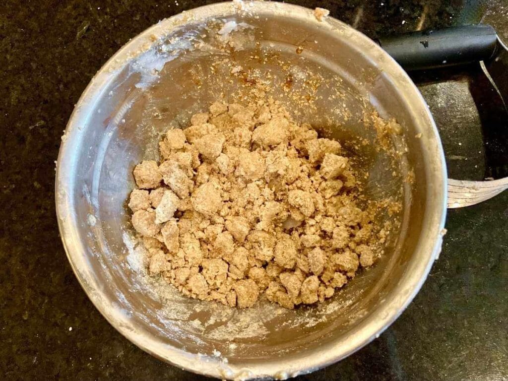Cutting coconut oil into gluten-free crumb topping