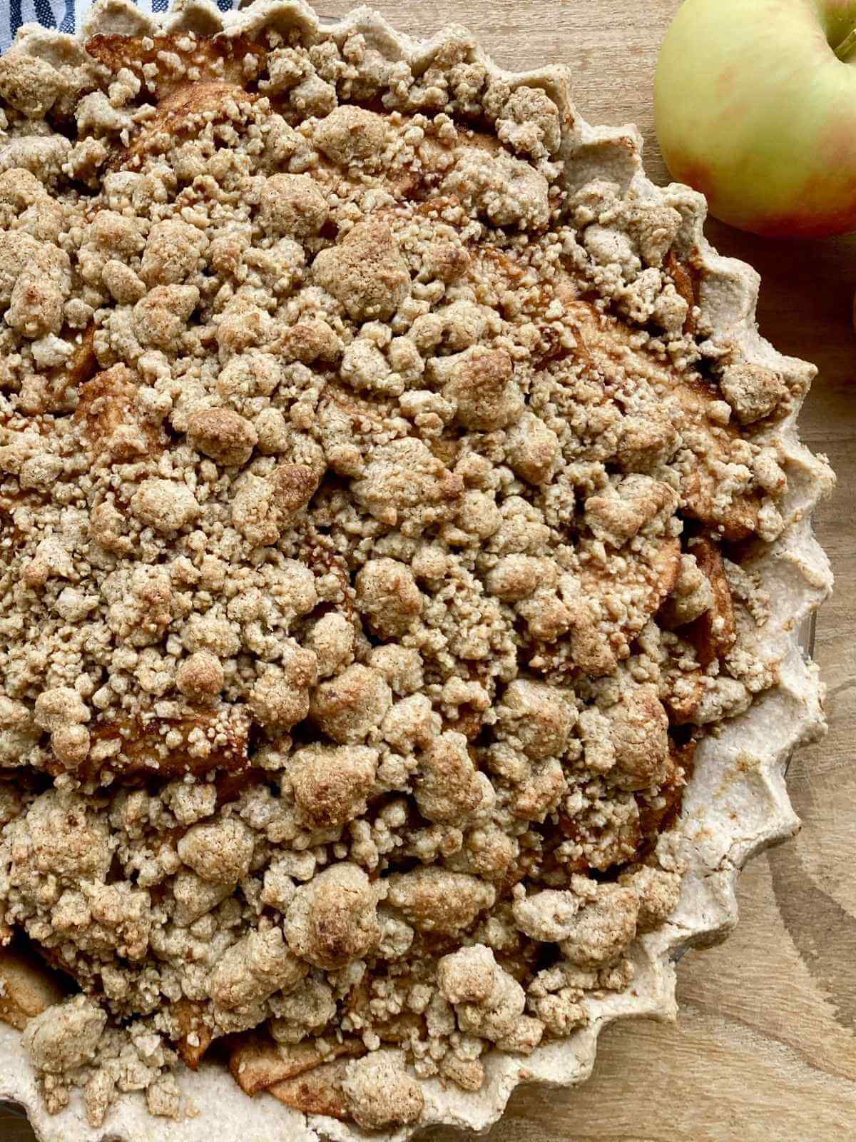 close up of gluten-free dutch apple pie with gluten-free crumb topping