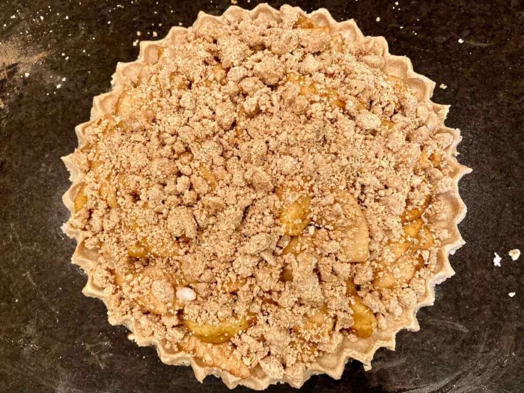 Unbaked gluten-free dutch apple pie with gluten-free crumb topping