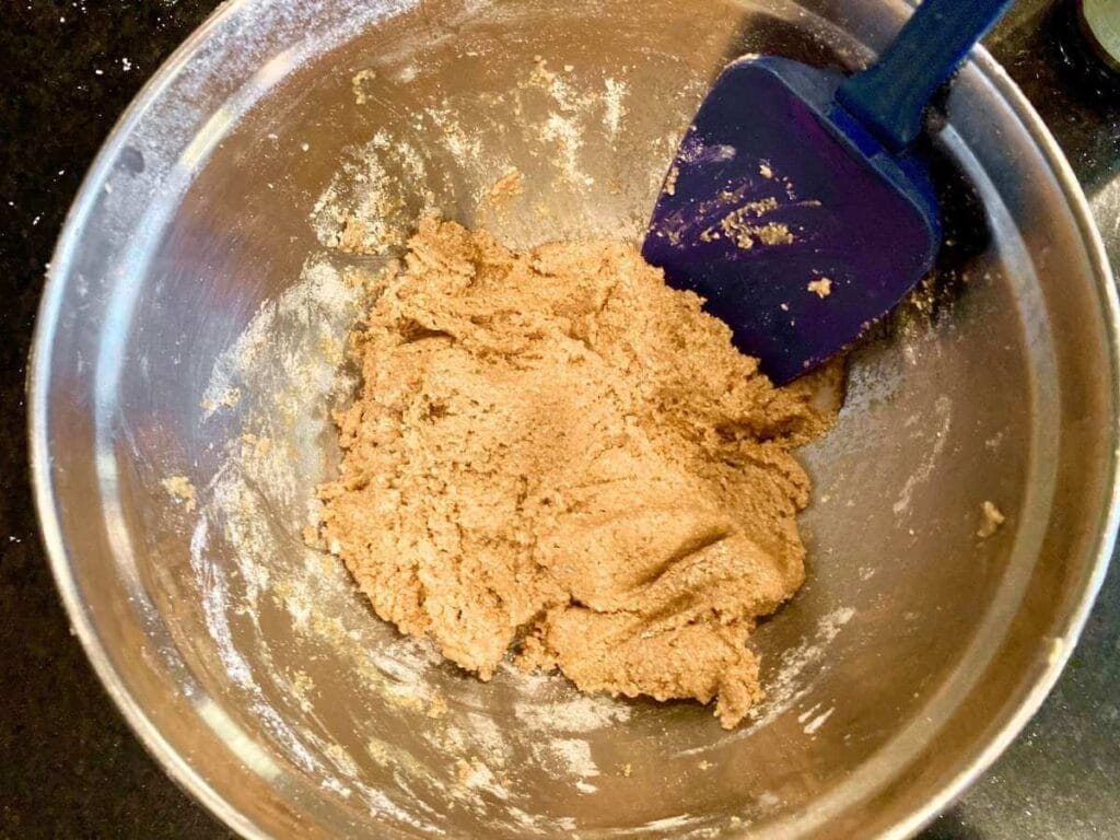 Stirring dough in mixing bowl