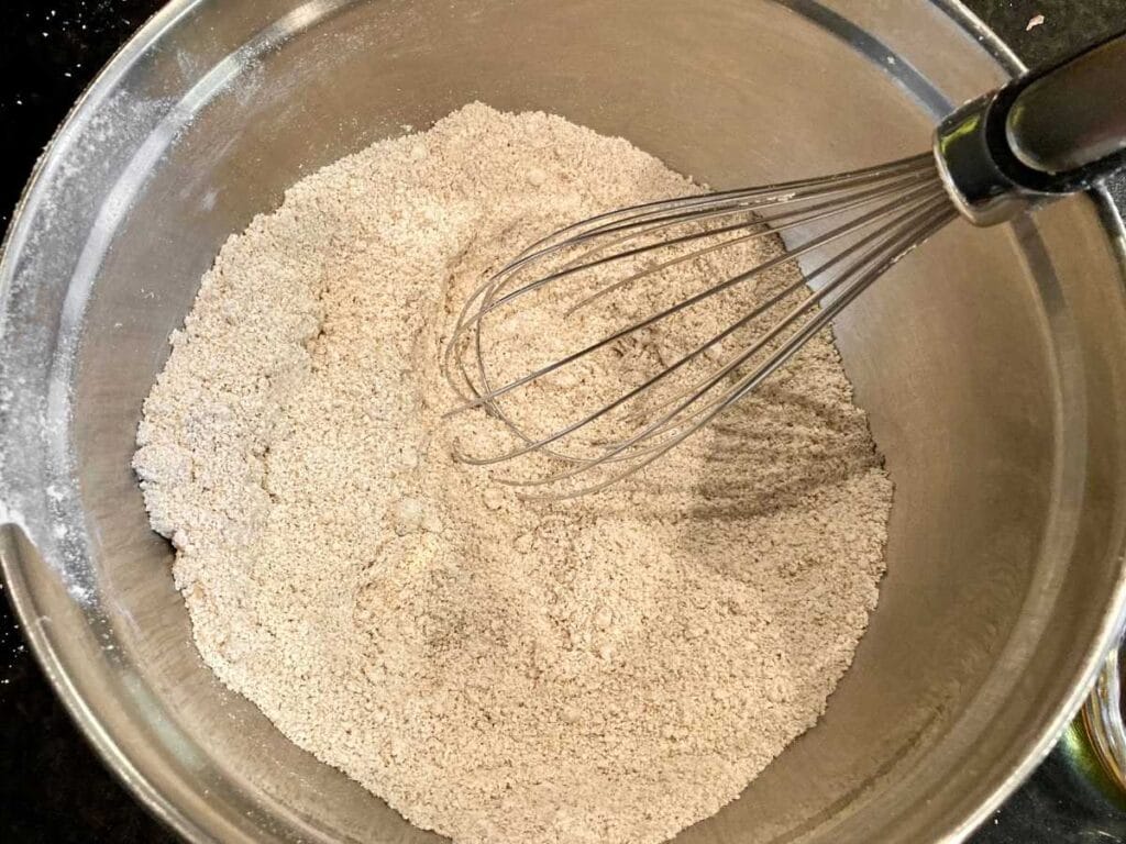 Whisking dry ingredients in bowl