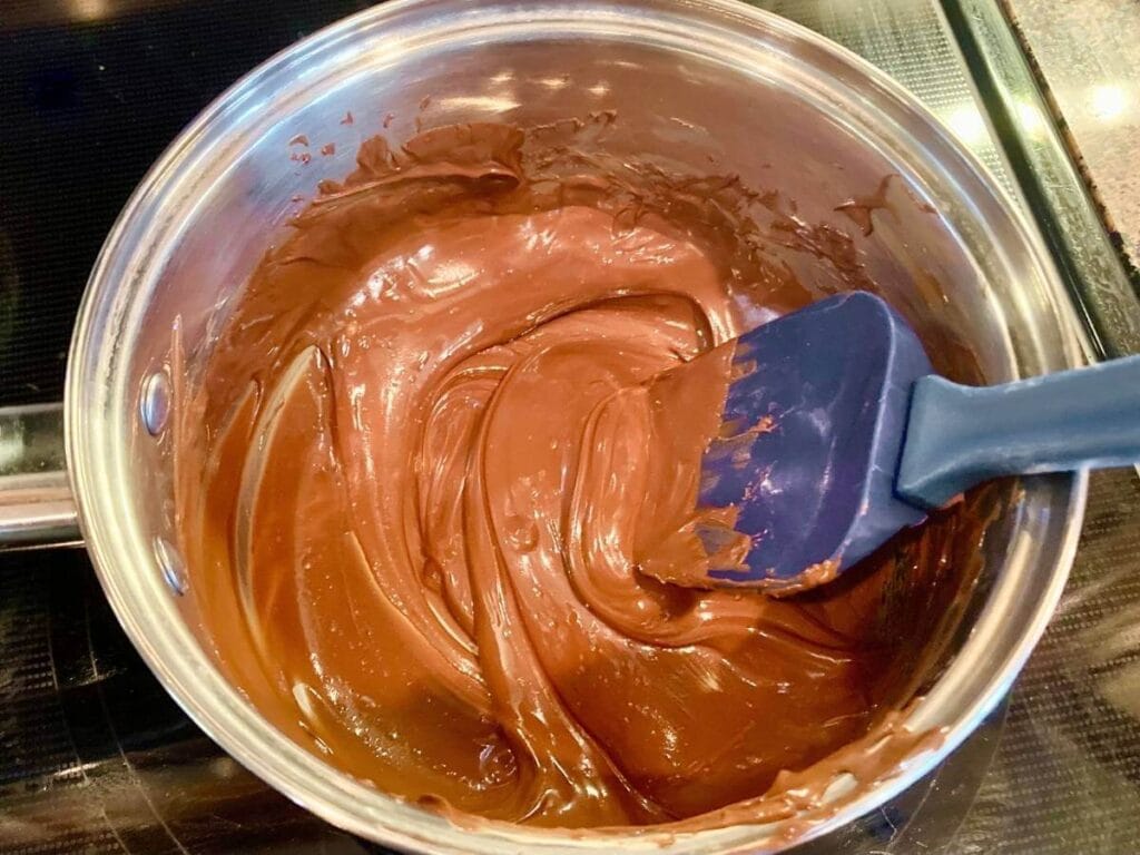 Melted chocolate in saucepan