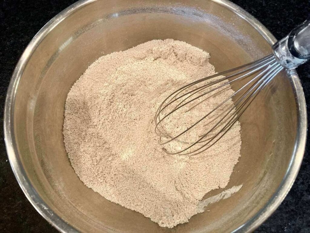 Whisking oat flour pie crust ingredients