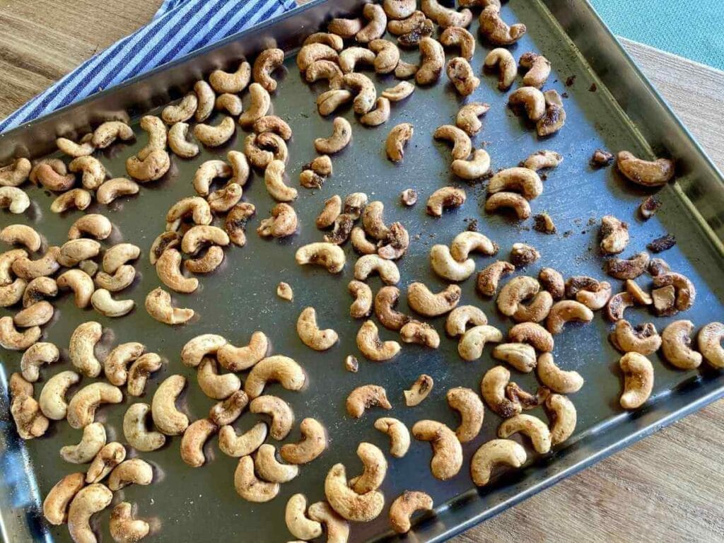 Roasted cashews on baking sheet
