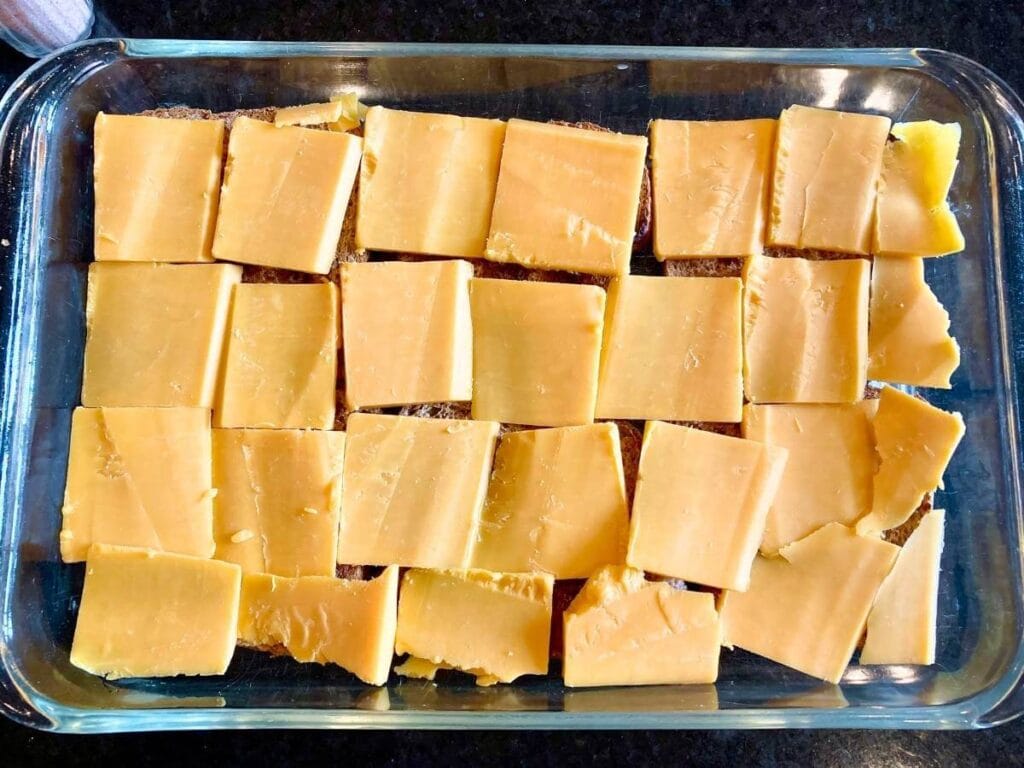 Layer of cheese in a baking dish
