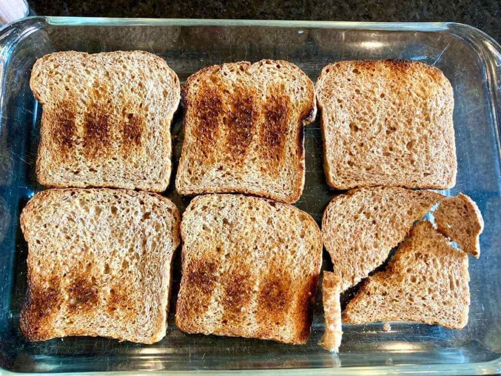 Layer of toast in a baking dish