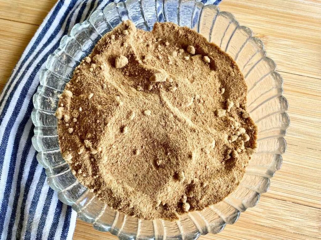 Top view of bowl of powdered coconut sugar