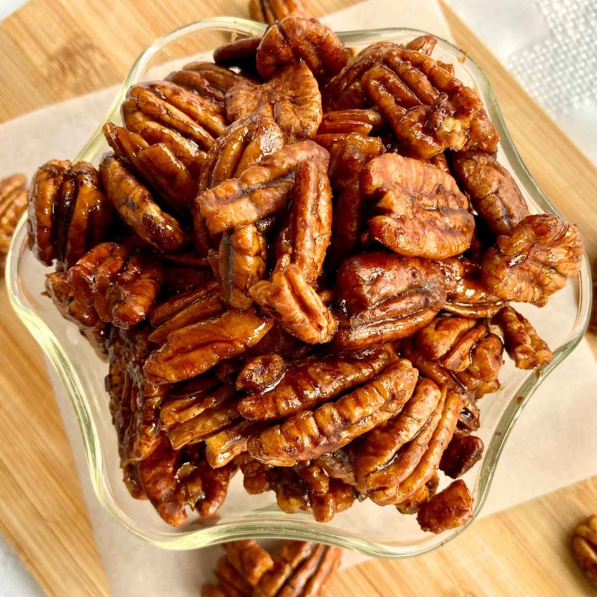 Candied pecans in glass bowl featured image