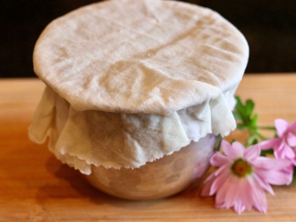 Bowl covered with beeswax food wrap.