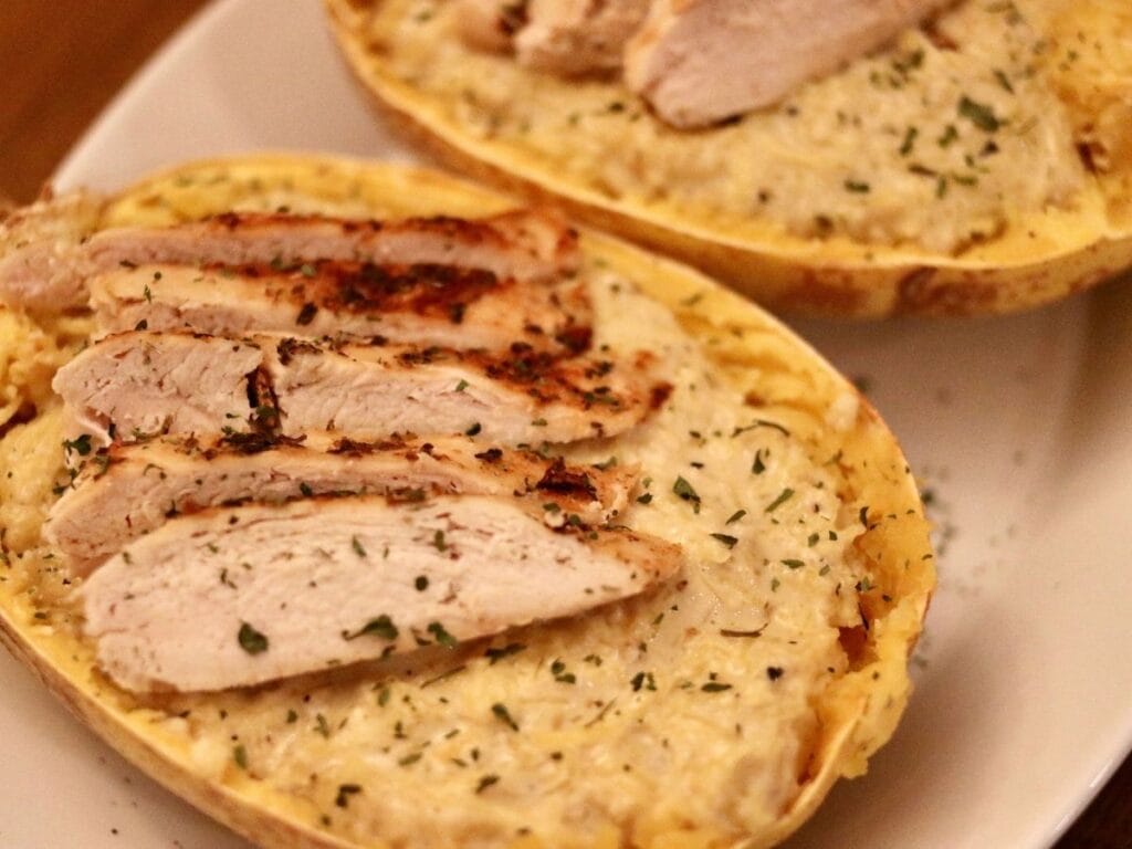 Side angle of chicken Alfredo spaghetti squash
